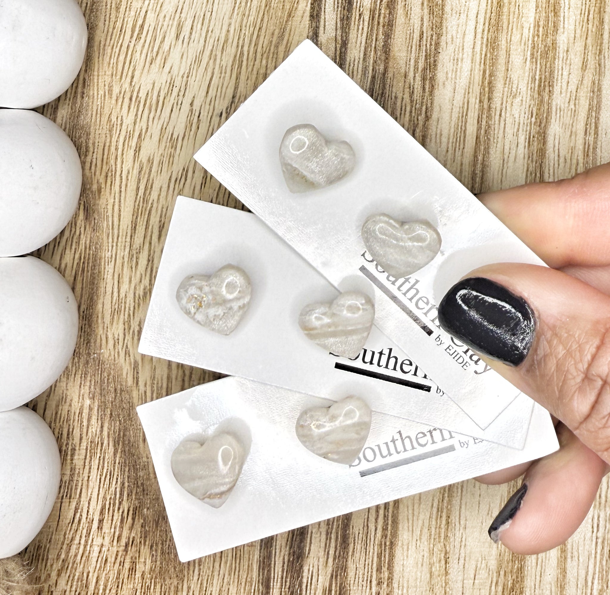 White translucent heart studs